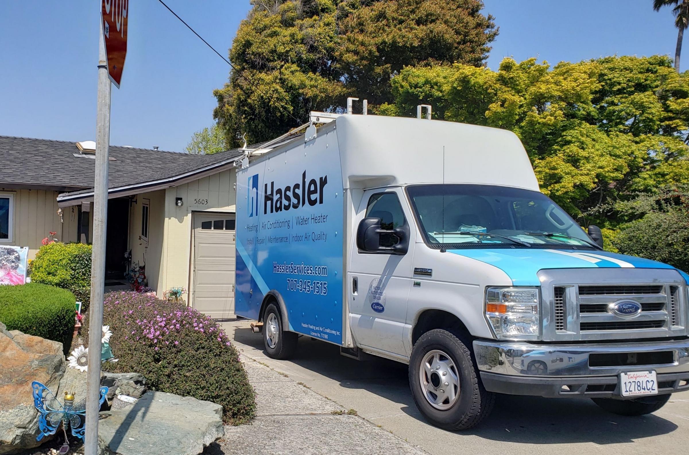 hassler truck outside a customer's home