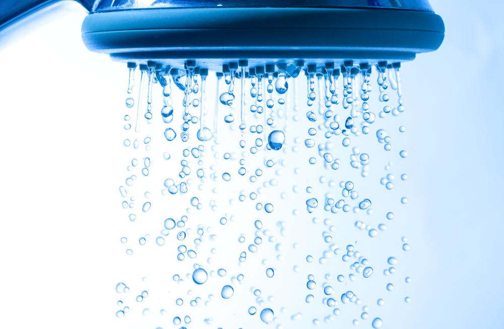 shower head running hot water